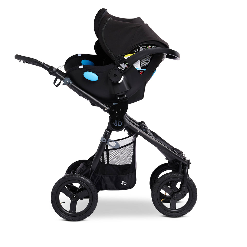
                  
                    Bumbleride Indie Twin in Black with Dual Clek Liing Infant Car Seats in Pitch Black Attached (Car Seat Adapter Set Included) - Profile View - Fabric Removed
                  
                