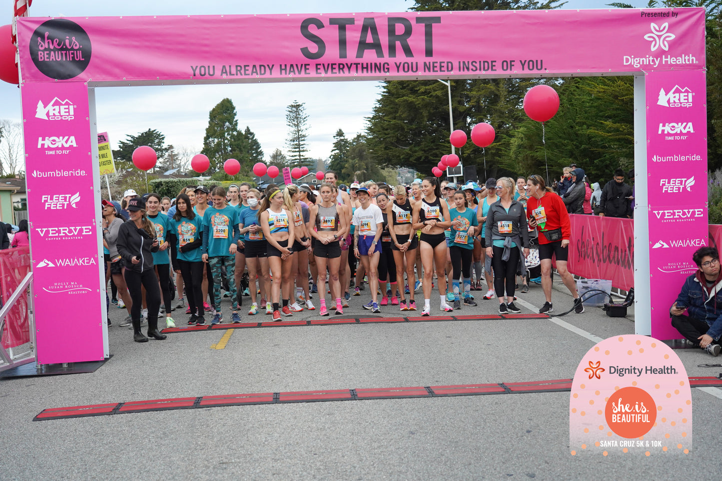 Photo of racers lining up at the She Is Beautiful 5k/10k Santa Barbara starting line
