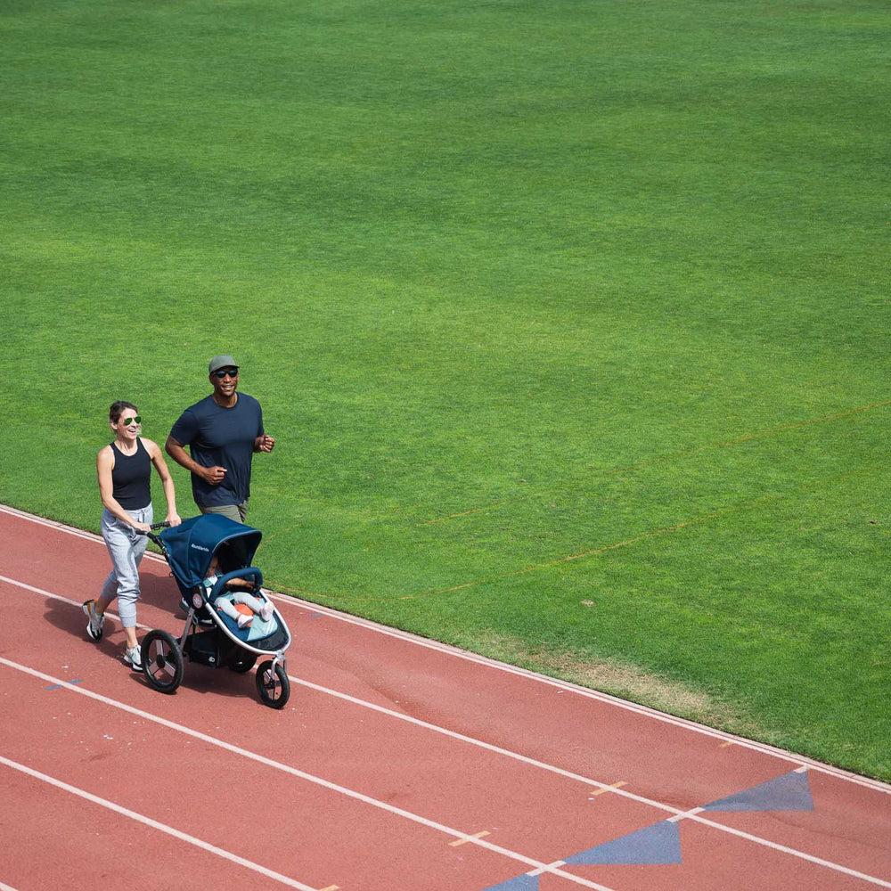 
                  
                    Picture of family starting their run on soft running track with Bumbleride Speed jogging stroller in Supernova. New Collection 2022. Global
                  
                