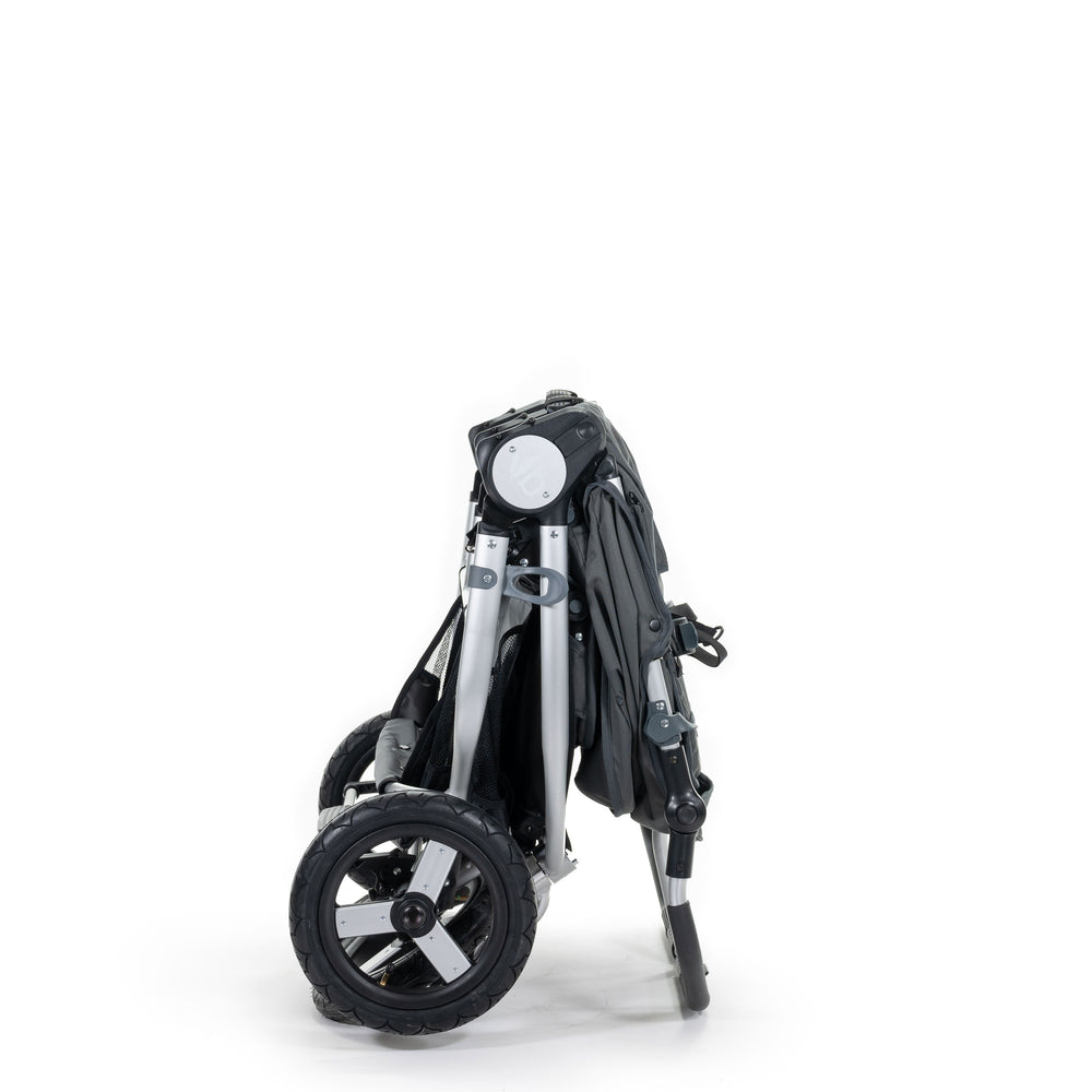 
                      
                        2020 Bumbleride Indie Twin Double Stroller in Dawn Grey - Folded Stowed Upright - Global
                      
                    
